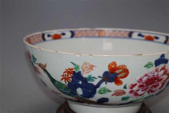 An 18th century Chinese verte Imari bowl on wood stand, c.1740, diameter 26cm